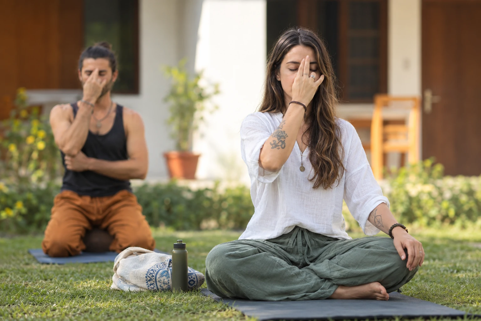 Pranayama practice in the garden during the monthly yoga package