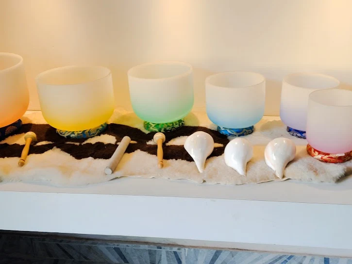 Singing bowls set up for a chakra healing retreat in Rishikesh